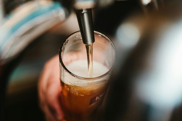 Beer being poured from pub tap