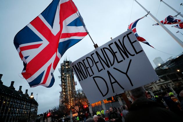 Brexit supporters gather during a rally in London, Friday, Jan. 31, 2020.