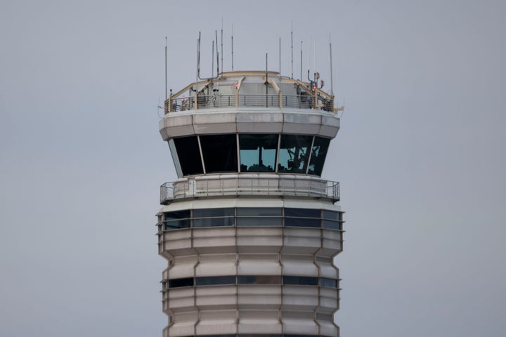 The air traffic control tower at Ronald Reagan Washington National Airport (DCA) in Arlington, Virginia, US, on Thursday, Jan. 30, 2025. (Photographer: Tierney L. Cross/Bloomberg via Getty Images)