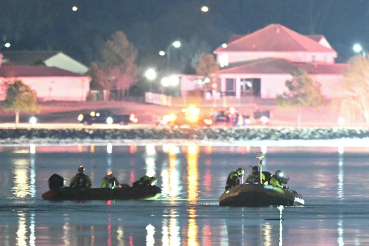 Rescue boats search the waters of the Potomac River after American Airlines flight 5342 on approach to Reagan National Airport crashed into the river outside Washington, D.C., on Jan. 30.