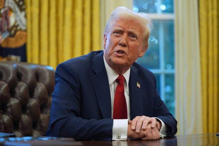 President Donald Trump speaks as he signs executive orders in the Oval Office Thursday in Washington.