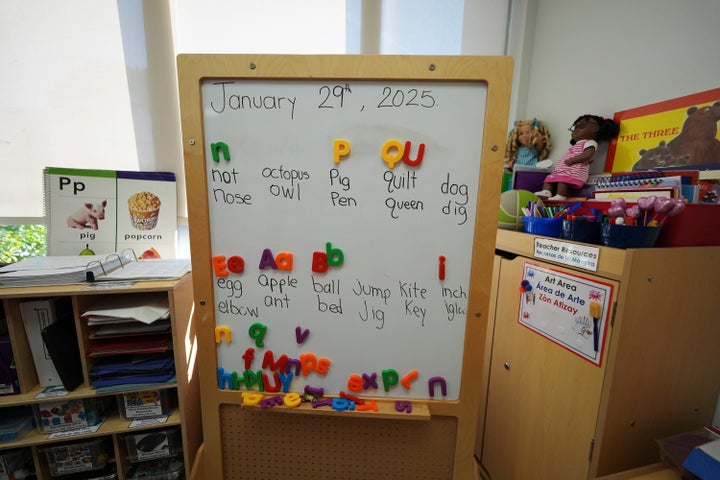 Words and magnetic letters are seen on a whiteboard during a reading and writing lesson at a Head Start program run by Easterseals, an organization that gets about a third of its funding from the federal government, on Jan. 29 in Miami.