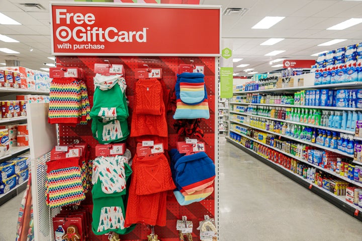 A display at Target offers a free gift card with the purchase of the items on the end cap.