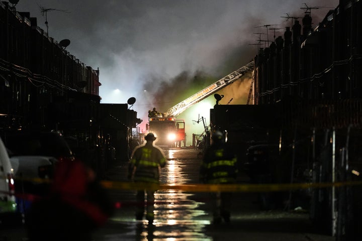 First responders work the scene after a small plane crashes in Philadelphia.