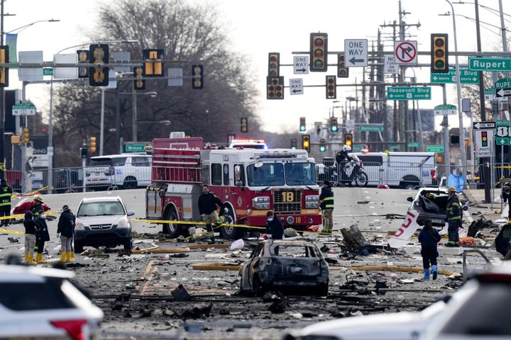 Investigators work the scene after a small plane crashed in Philadelphia, Saturday, Feb. 1, 2025. (AP Photo/Matt Rourke)