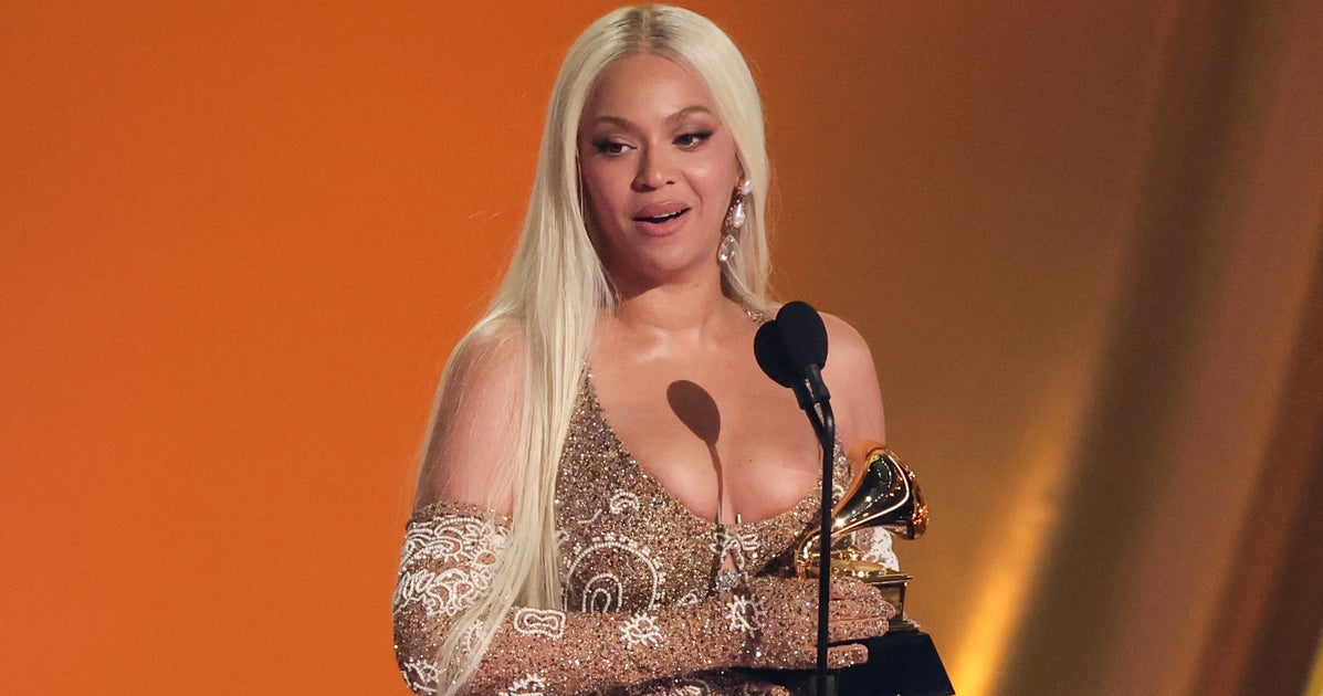 NextImg:Beyoncé's Shocked Reaction To Grammys Win Goes Viral