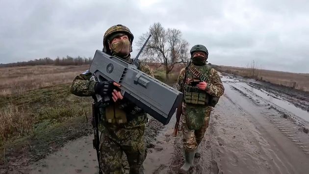 Russian soldiers get ready to shoot Ukrainian drones on an undisclosed location in Ukraine in January 2025.