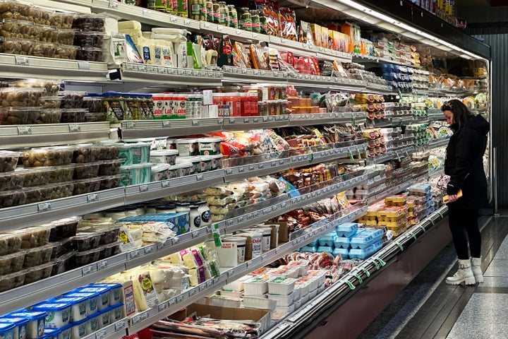 A customer shops at a grocery store in Wheeling, Ill., Wednesday, Dec. 11, 2024. (AP Photo/Nam Y. Huh)