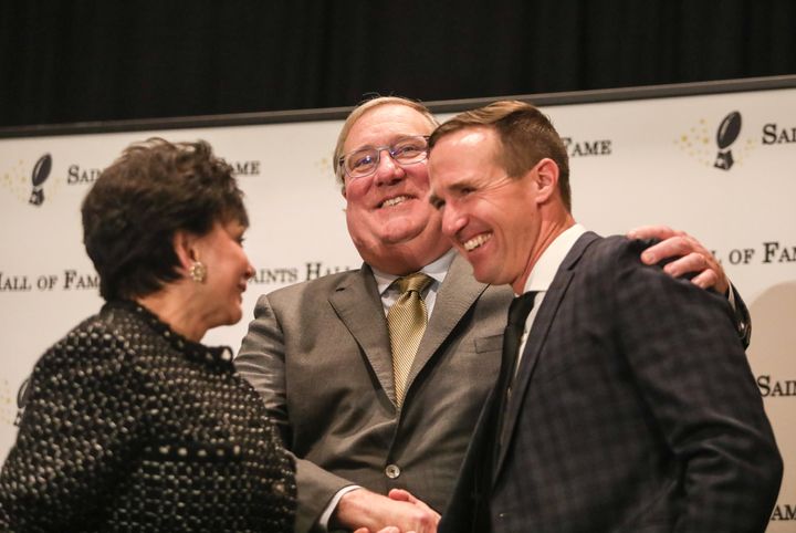 Team owner Gayle Benson was behind the effort and president Dennis Lauscha (pictured with Drew Brees) counseled the church on crisis management in dealing with the media, Associated Press reported.