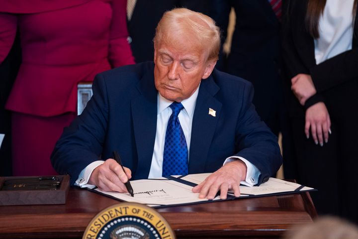 President Donald Trump signs the Laken Riley Act in the East Room of the White House on Wed, Jan. 29, 2025, in Washington.