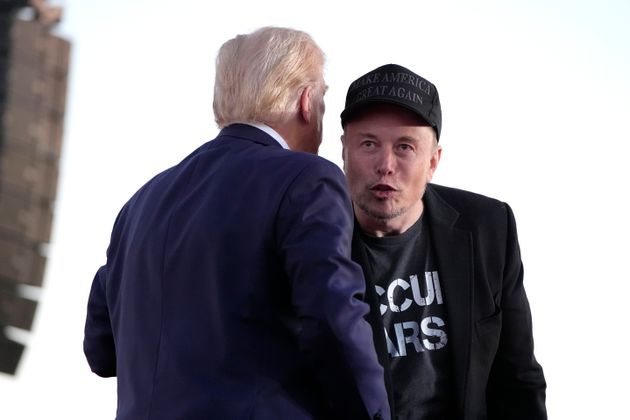 Republican presidential nominee former President Donald Trump, left, and Tesla and SpaceX CEO Elon Musk appear on stage at a campaign event at the Butler Farm Show, Saturday, Oct. 5, 2024, in Butler, Pa.