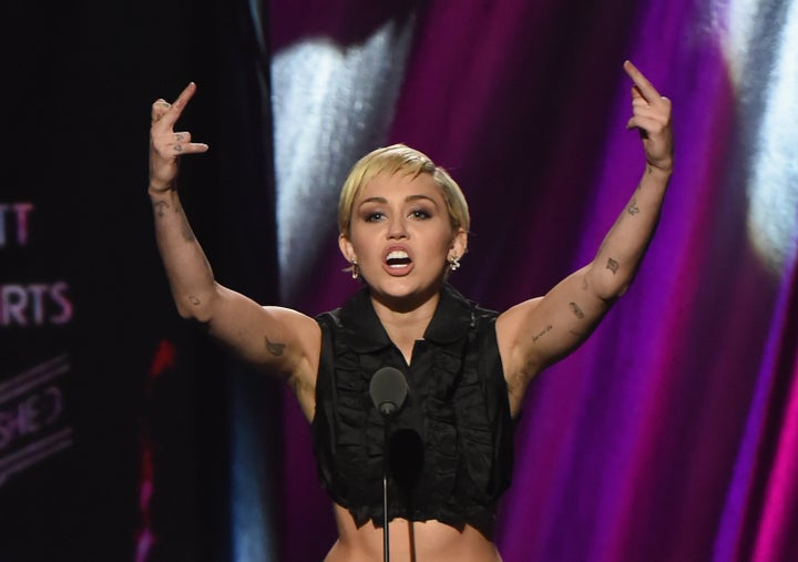 Miley Cyrus showed visible underarm hair onstage during the 30th Annual Rock and Roll Hall of Fame Induction Ceremony on April 18, 2015, in Cleveland, Ohio. 