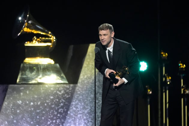 Producer Finn Keane accepting a Grammy for his work on Brat