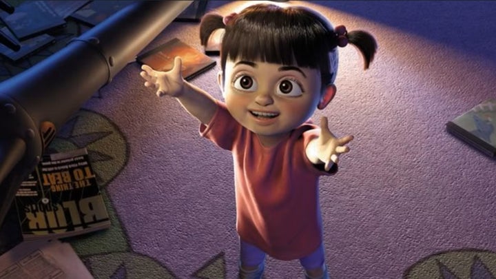 Boo from Monsters Inc. with hands outstretched