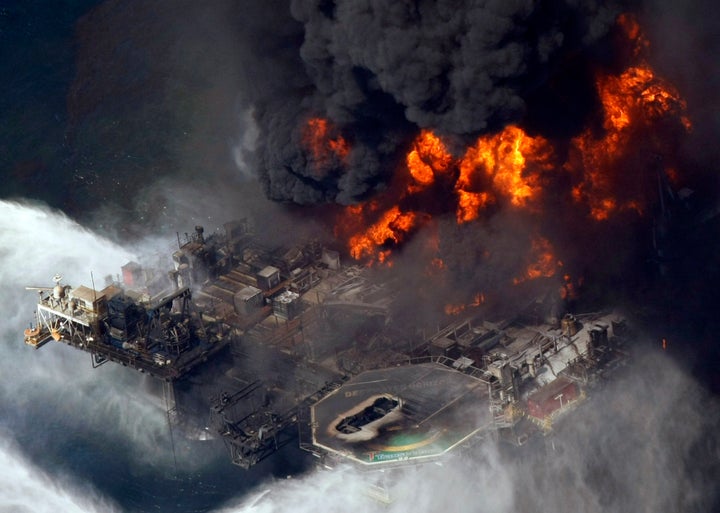 A plume of smoke rises from fires on BP's Deepwater Horizon offshore oil rig in the Gulf of Mexico on April 21, 2010.