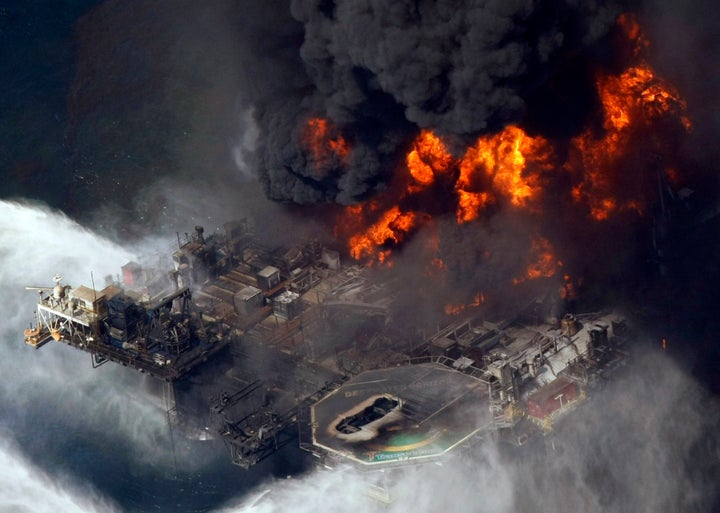 A plume of smoke rises from fires on BP's Deepwater Horizon offshore oil rig in the Gulf of Mexico on April 21, 2010. 