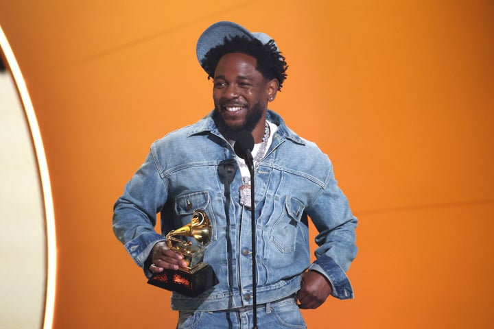 Kendrick Lamar accepts the Record of the Year award for "Not Like Us" at the 2025 Grammys, weeks after Drake filed a lawsuit about the track against UMG, the rappers' record label.