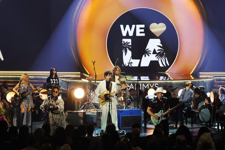 (Left to right) Sheryl Crow, Brittany Howard, St. Vincent, Taylor Goldsmith and Griffin Goldsmith of Dawes, Brad Paisley and John Legend perform onstage at the 67th annual Grammy Awards in a tribute to the spirit of LA after the wildfires that ravaged the city early this year.