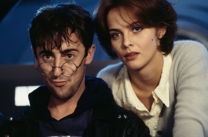 Cumming as Boris Grishenko and Izabella Scorupco as Natalya Simonova in "GoldenEye." Cumming recently spoke about a "nightmare" stunt he dealt with while filming the movie.