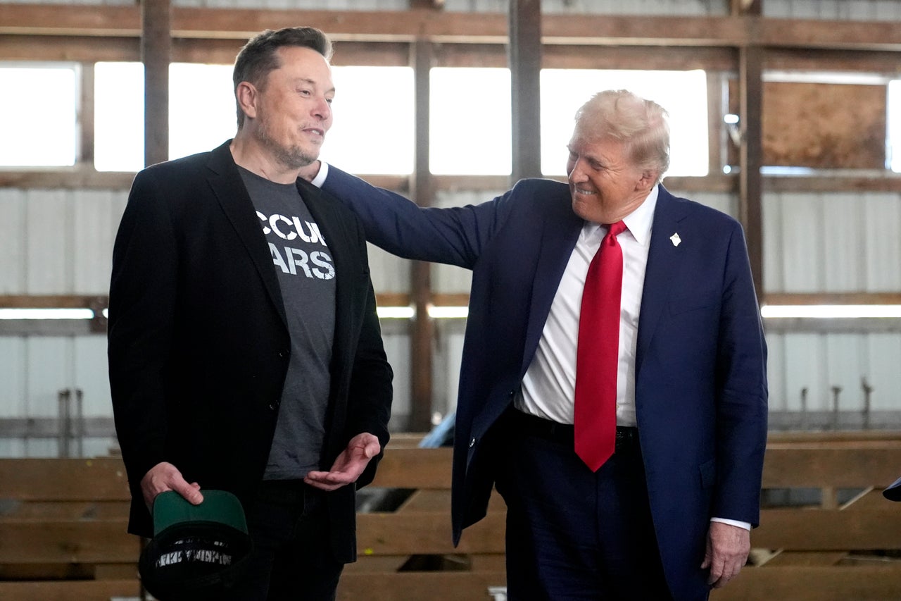 Tesla and SpaceX CEO Elon Musk, left, and Republican presidential nominee former President Donald Trump attend a campaign event at the Butler Farm Show, Oct. 5, 2024, in Butler, Pa.