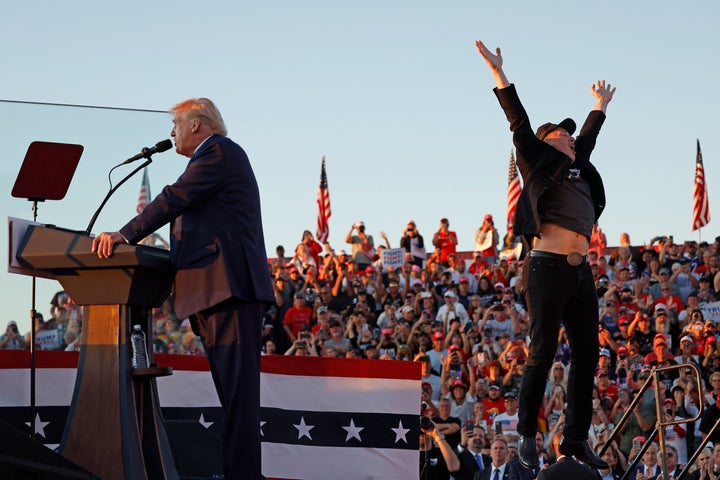 Elon Musk leaps on stage with then-presidential nominee Donald Trump during an Oct. 5 campaign rally in Butler, Pennsylvania. Trump had returned to Butler after an attempted assassination on July 13.