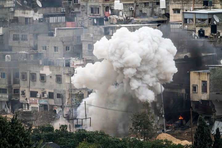 Israeli soldiers detonate an explosive device during a military raid in the West Bank refugee camp of Nur Shams, Tulkarem, on Sunday, Feb. 9, 2025.