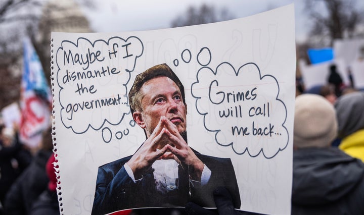 A sign depicting Elon Musk is seen at a rally in Upper Senate Park on Wednesday, February 5, 2025. (Tom Williams/CQ-Roll Call, Inc via Getty Images)