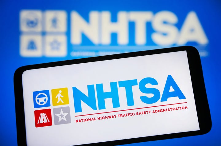 In this photo illustration, a National Highway Traffic Safety Administration (NHTSA) logo is seen on a smartphone and on a pc screen. (Photo Illustration by Pavlo Gonchar/SOPA Images/LightRocket via Getty Images)