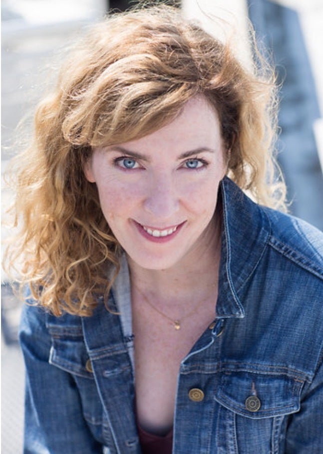 A professional photo of the author that was part of the $4K she spent to get four dates.