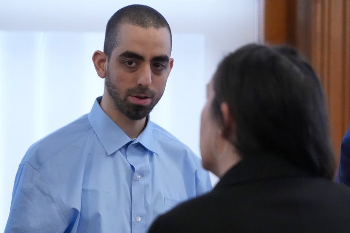 Hadi Matar talks with his defense team before leaving the Chautauqua County courthouse after his second day of trial Tuesday in Mayville, New York.