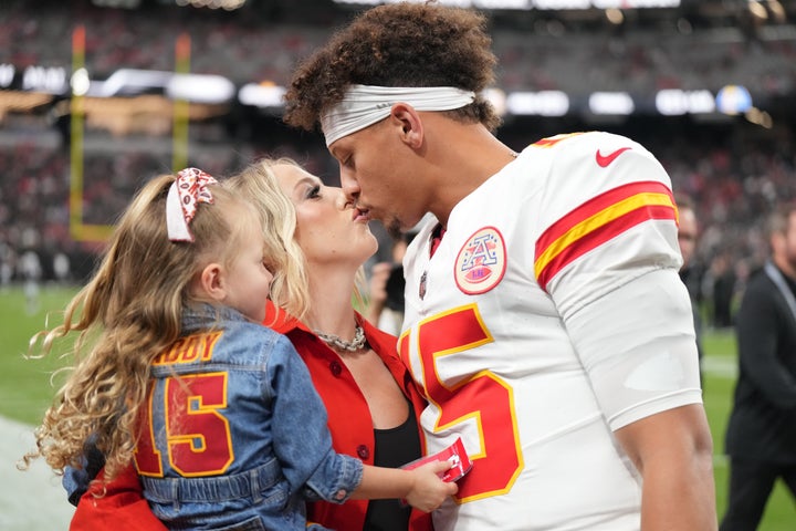 Kansas City Chiefs Patrick Mahomes kisses his wife Brittany and daughter Sterling following the game vs Las Vegas Raiders at Allegiant Stadium on Oct. 27, 2024.