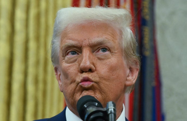 US President Donald Trump speaks after Tulsi Gabbard was sworn in as Director of National Intelligence (DNI) in the Oval Office of the White House in Washington, DC, on February 12, 2025.