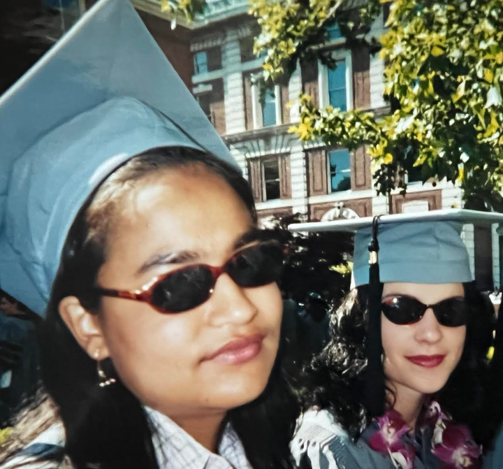 The author (right) and Nisha at their college graduation in May, 2022. "Here we are sneering in our sunglasses at all the pomp of graduation, not yet two months after Nisha's first transplant," she writes.