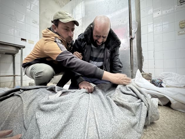  Family members mourn for 15-year-old Palestinian Enes Sikr Ahmed Nebahin, who was shot and killed by an Israeli sniper while checking his family home in the recently evacuated Juhur al-Dik area,after his body brought to Al-Aqsa Martyrs Hospital morgue in Deir al-Balah, Gaza on February 13, 2025. 