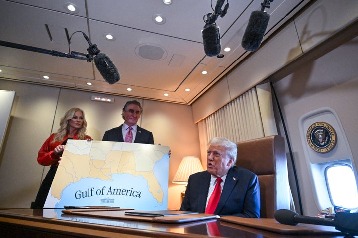 President Donald Trump speaks to the press after signing a proclamation renaming the Gulf of Mexico the "Gulf of America" aboard Air Force One on Feb. 9, 2025. 