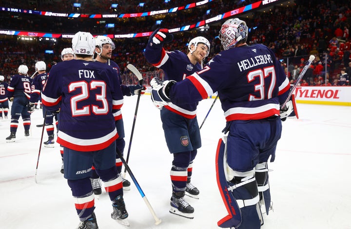 MONTREAL, QUEBEC - FEBRUARY 15: Connor Hellebuyck #37 of Team United States celebrates with Matthew Tkachuk #19 after their 3-1 win in the 4 Nations Face-Off game between the United States and Canada at Bell Centre on February 15, 2025 in Montreal, Quebec. (Photo by Vitor Munhoz/4NFO/World Cup of Hockey via Getty Images)