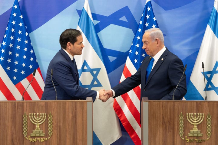 U.S. Secretary of State Marco Rubio and Israeli Prime Minister Benjamin Netanyahu shake hands during a joint press conference at the prime minister's office in Jerusalem on Feb. 16, 2025. 