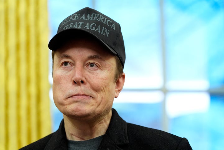 Elon Musk listens during an event in the Oval Office with President Donald Trump at the White House, Tuesday, Feb. 11, 2025, in Washington. (Photo/Alex Brandon)