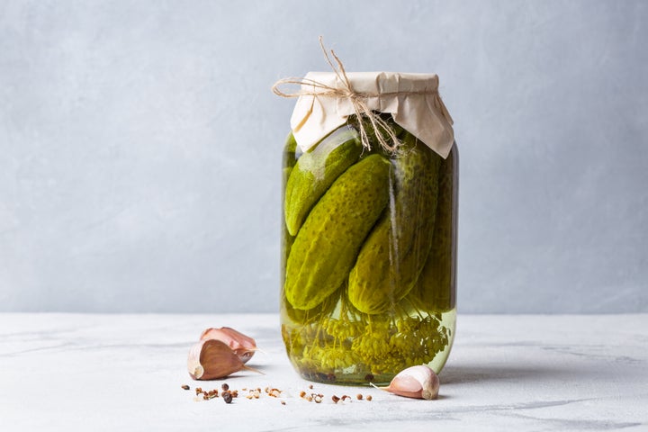 A big old jar of fermented pickles.