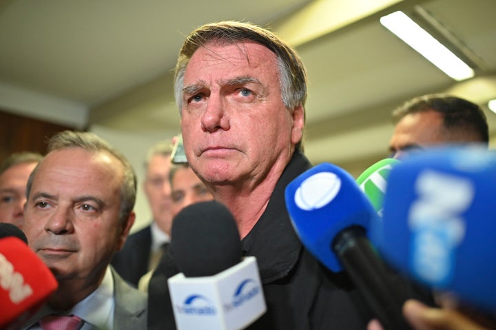 In Brasilia, Brazil, on February 18, 2025, former Brazilian President Jair Bolsonaro speaks to the press after lunch and a visit to the Liberal Party (PL) leaders in the Federal Senate. (Photo by Ton Molina/NurPhoto via Getty Images)