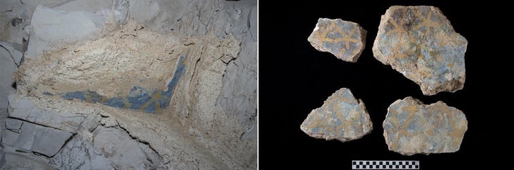 Pieces of blue and yellow painted plaster were among the items recovered from the tomb.