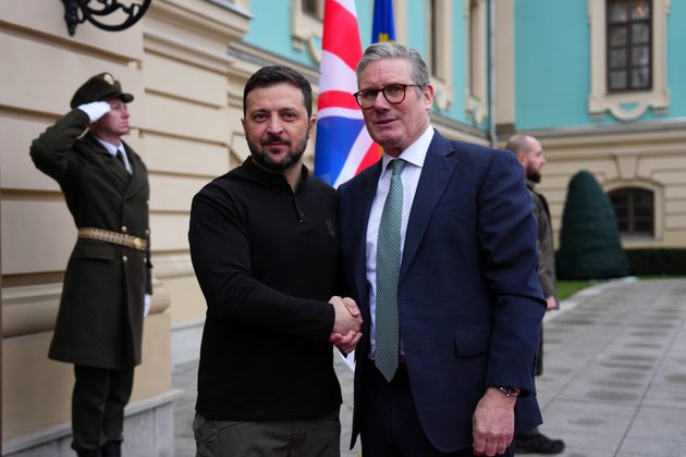 British Prime Minister Keir Starmer, right and Ukrainian President Volodymyr Zelenskyy arrive for their bilateral talks in Kyiv, Ukraine Thursday, Jan. 16, 2025. 