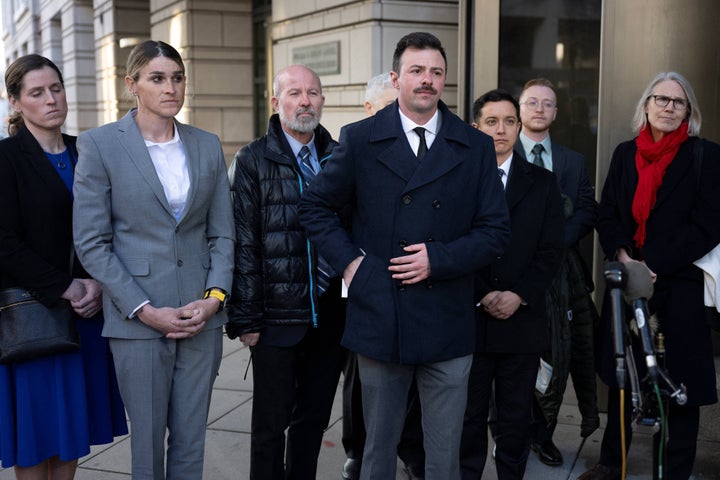 US Army Reserve 2nd Lt. Nicolas Talbott (C), plaintiff of the case, speaks outside the William B. Bryant Annex of the US Courthouse in Washington, DC, on February 18, 2025.