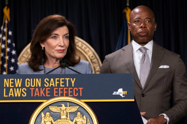 New York Gov. Kathy Hochul, left, and New York Mayor Eric Adams attend a news conference about the upcoming "Gun Free Zone" implementation at Times Square, Aug. 31, 2022.