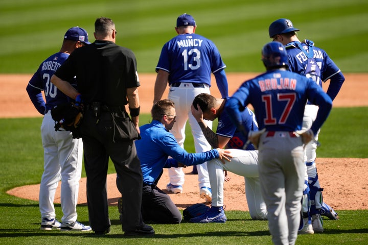 Miller, pictured mere moments after collapsing following the speedy line drive from Busch. 