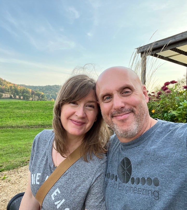 The author with her partner Steve, visiting a Wisconsin farm in 2022.