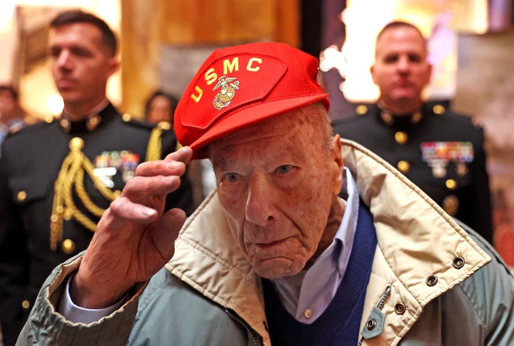 Iwo Jima veteran Joe Cappuccino, 99, commemorates the battle's 80th anniversary in Boston. Trump's Department of Veterans Affairs let go of 1,000 employees this week, including some who worked on a crisis hotline.