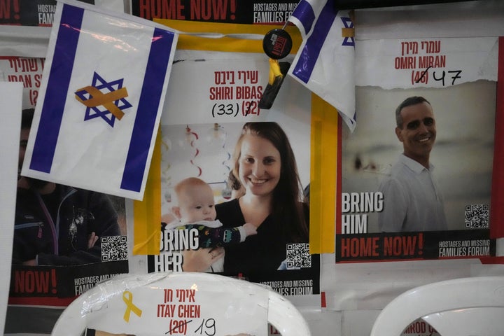 A poster shows Shiri Bibas, who was kidnapped to Gaza with her husband and two young sons on Oct. 7, 2023, in Jerusalem, Friday, Feb. 21, 2025. (AP Photo/Mahmoud Illean)