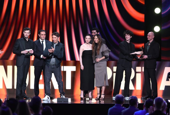 SANTA MONICA, CALIFORNIA - FEBRUARY 22: (L-R) Alex Coco, Karren Karagulian, Sean Baker, Mikey Madison, Vache Tovmasyan, Samantha Quan, Mark Eydelshteyn, and Yura Borisov accept the Best Feature Award for "Anora" onstage during the 2025 Film Independent Spirit Awards on February 22, 2025 in Santa Monica, California. (Photo by Kevin Winter/Getty Images)