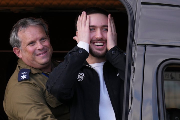 Freed Israeli hostage Omer Shem Tov looks on from a van as he arrives at Beilinson hospital in Petah Tikva, Israel, after he was released from Hamas captivity in the Gaza Strip, Saturday, Feb. 22, 2025.